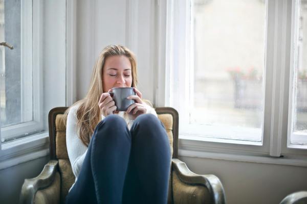 woman sitting drinking