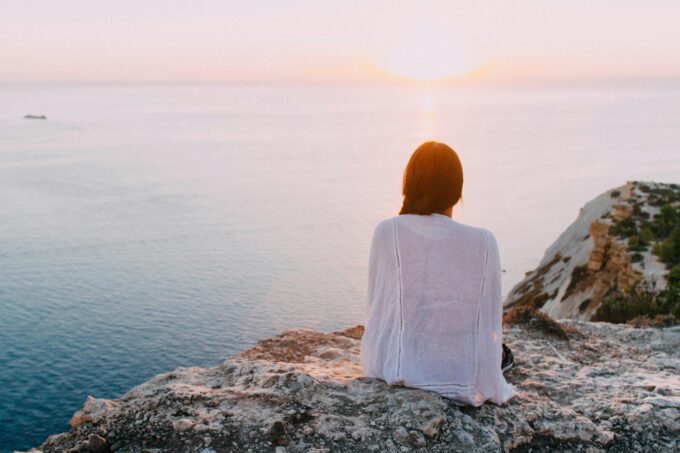 woman sitting looking at view