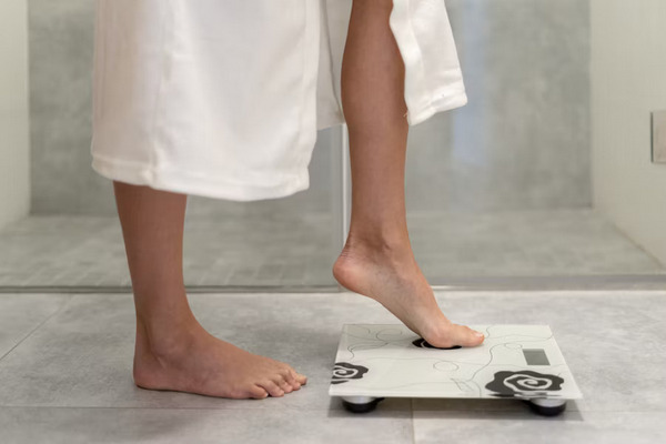 standing on weighing scales